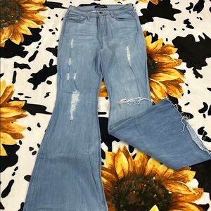 Distressed Light Blue Flare Jeans